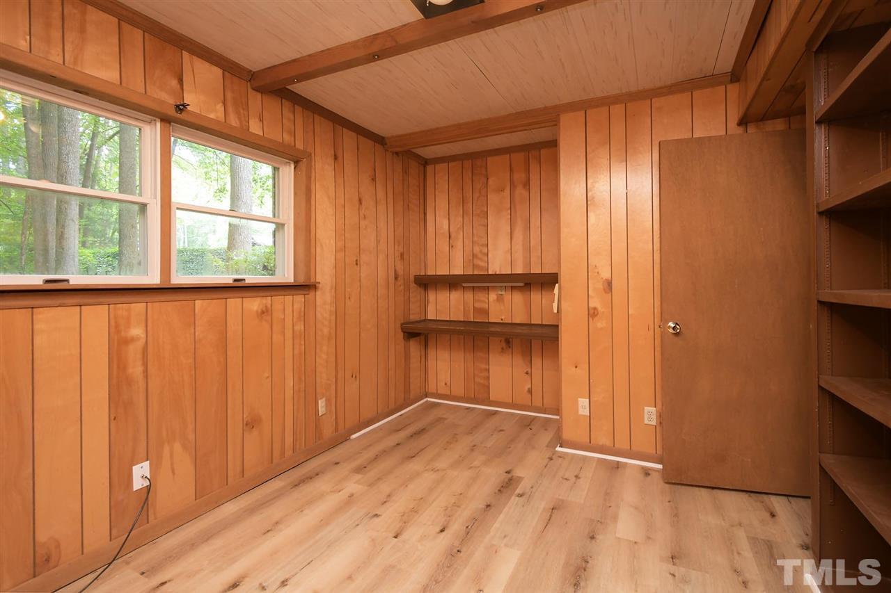 19 Learned Place Durham, NC 27705 - Photo 23 of 30 a view of empty room with wooden floor and fan