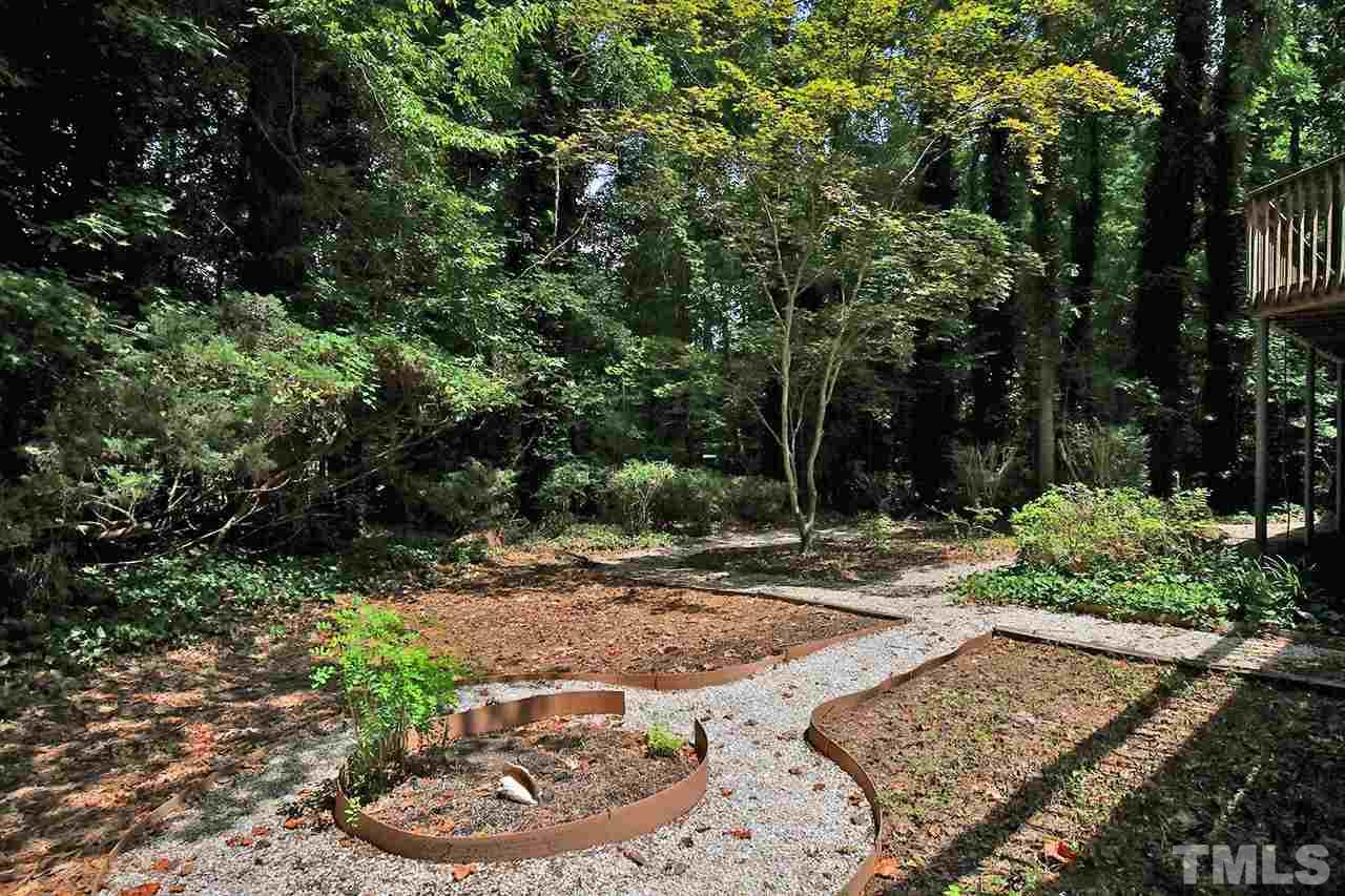 19 Learned Place Durham, NC 27705 - Photo 26 of 30 a view of a backyard with plants and trees