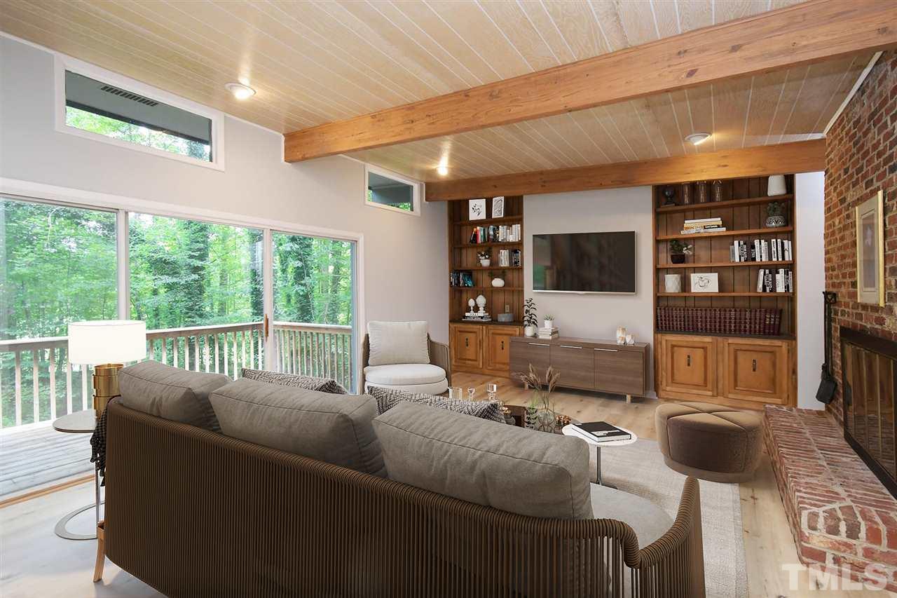 19 Learned Place Durham, NC 27705 - Photo 9 of 30 a living room with furniture and a large window