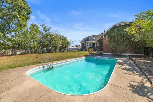 an aerial view of a house with garden space sitting space