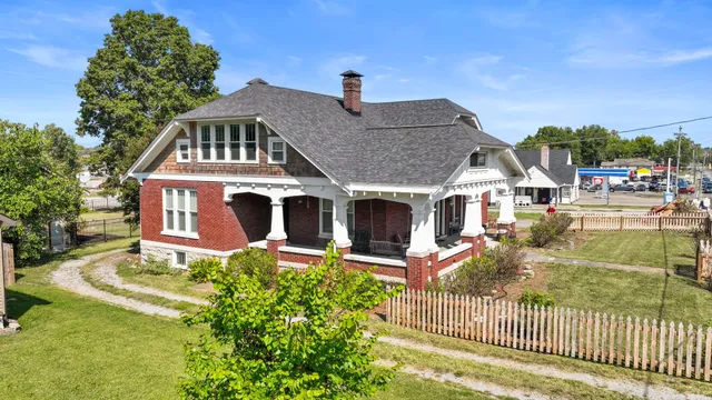 an aerial view of houses with outdoor space