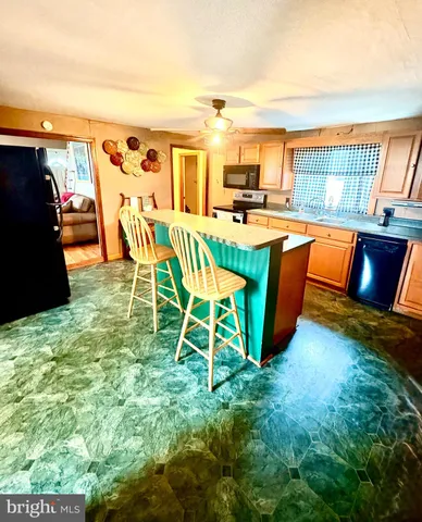 a view of a chairs in a patio