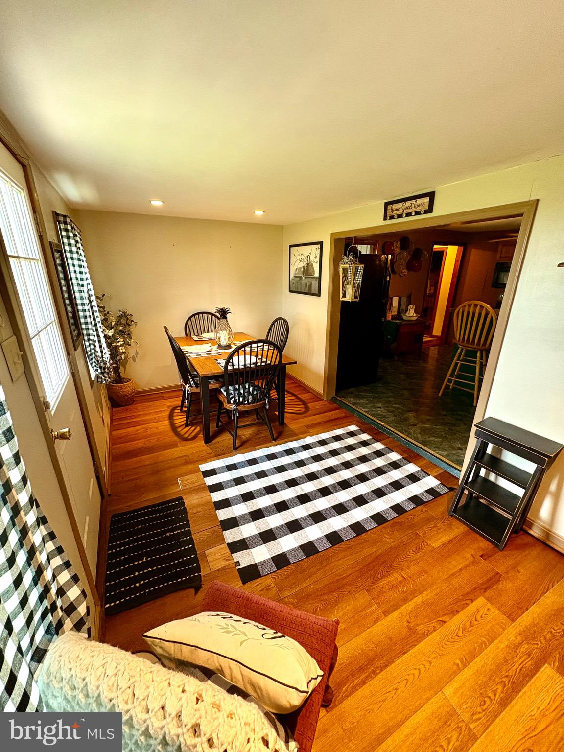 3411 Marsh Road Ewell, MD 21824 - Photo 9 of 24 a bedroom with a bed and furniture