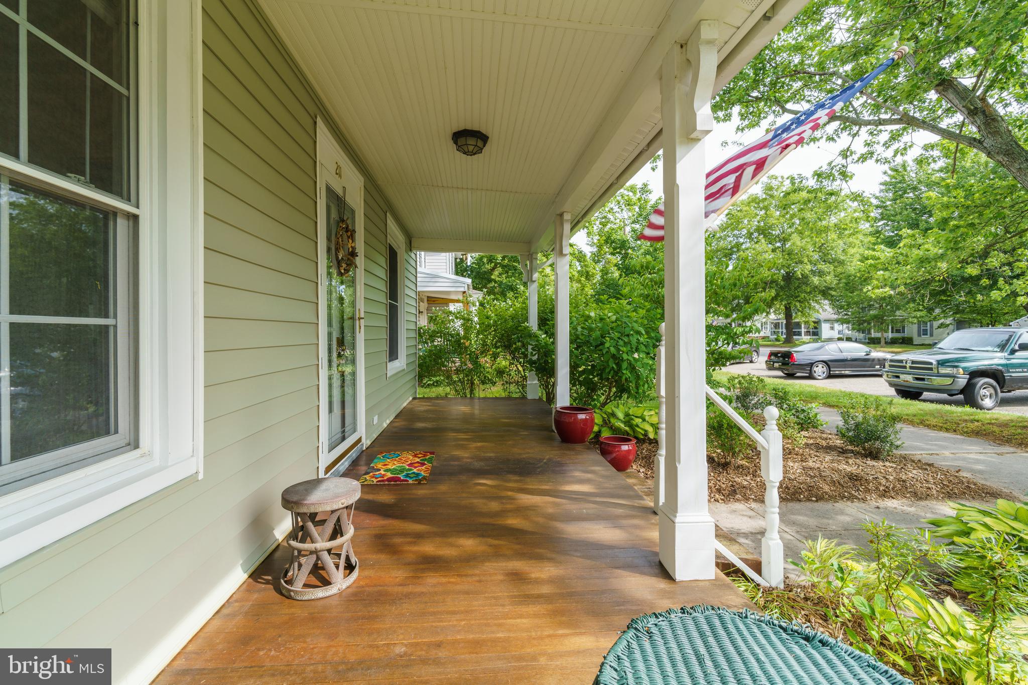 211 Central Ridgely, MD 21660 - Photo 5 of 44 Large front porch with Mahogany wood floors