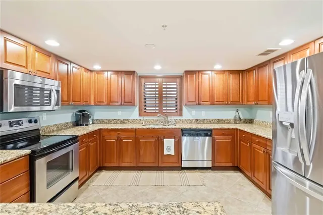 a bathroom with a toilet a sink and a mirror