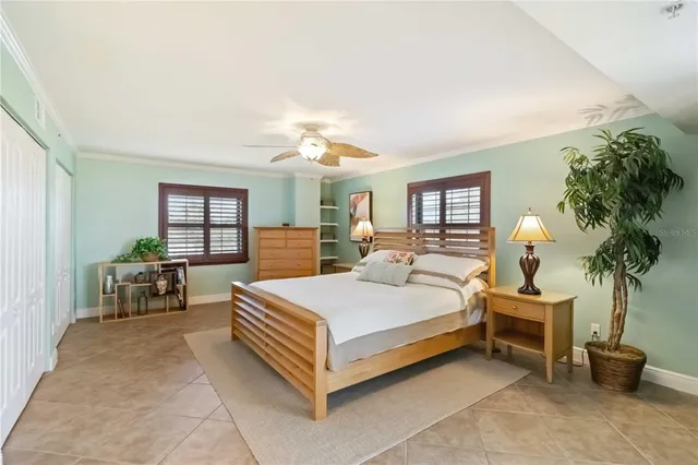 a view of a chairs and table in the balcony