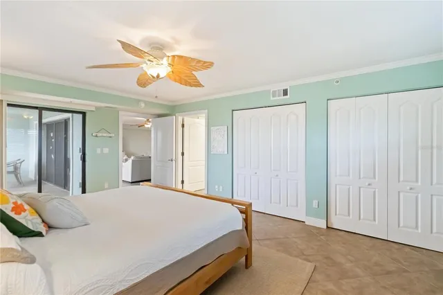 a view of a chairs and table in the balcony