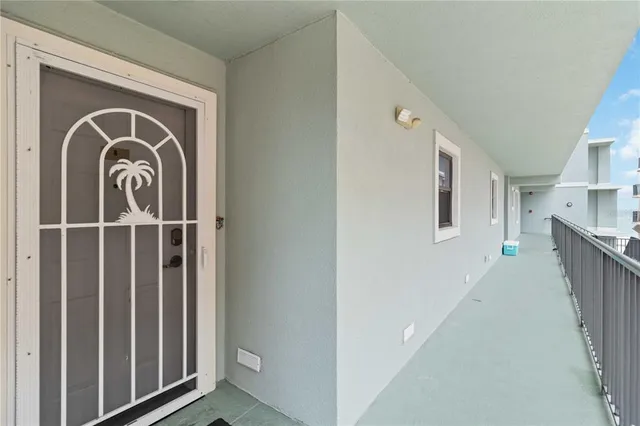 a kitchen with stainless steel appliances kitchen island granite countertop a refrigerator and a stove top oven