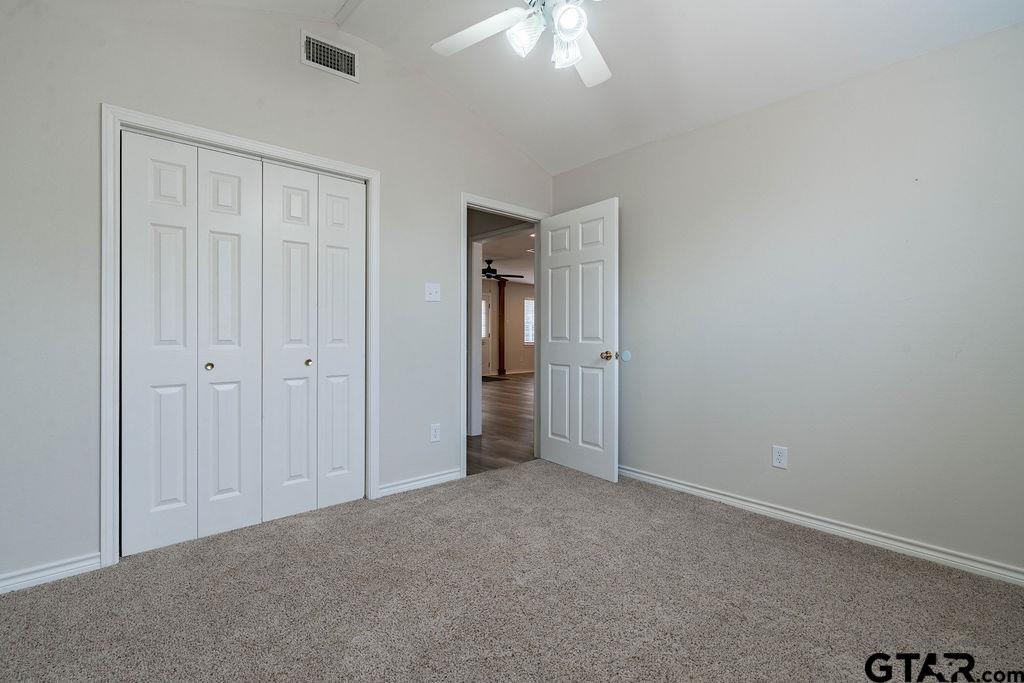 360 Anderson County Road Palestine, TX 75803 - Photo 1 of 41 an empty room with closet area