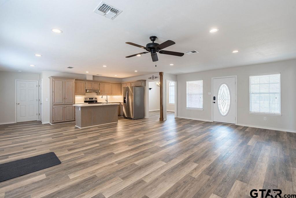 360 Anderson County Road Palestine, TX 75803 - Photo 14 of 41 a view of empty room with wooden floor and window