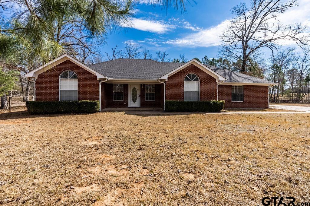 360 Anderson County Road Palestine, TX 75803 - Photo 33 of 41 a front view of a house with a yard
