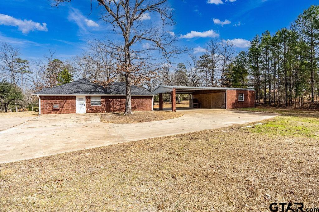 360 Anderson County Road Palestine, TX 75803 - Photo 6 of 41 a view of house with outdoor space
