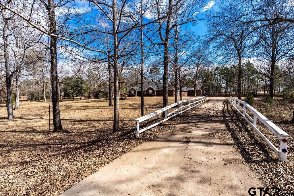 360 Anderson County Road Palestine, TX 75803 - Photo 10 of 41 a view of a yard with wooden fence