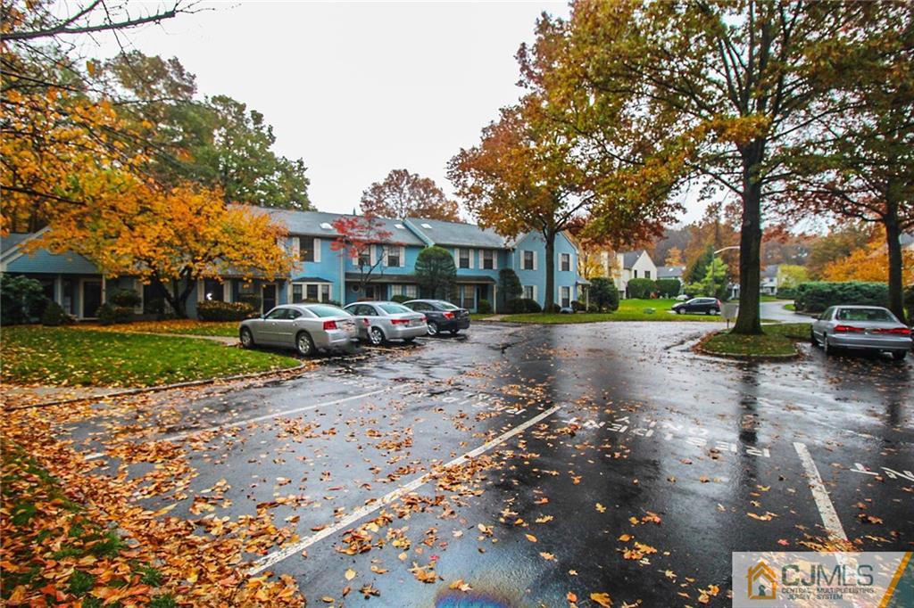 1705 Timber Oaks Road, Unit 1705 Edison, NJ 08820 - Photo 2 of 25 a view of street with parked cars