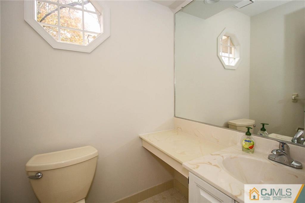 1705 Timber Oaks Road, Unit 1705 Edison, NJ 08820 - Photo 15 of 25 a bathroom with a toilet and a sink