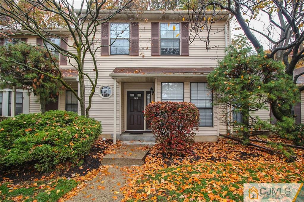 1705 Timber Oaks Road, Unit 1705 Edison, NJ 08820 - Photo 3 of 25 a front view of house with a garden