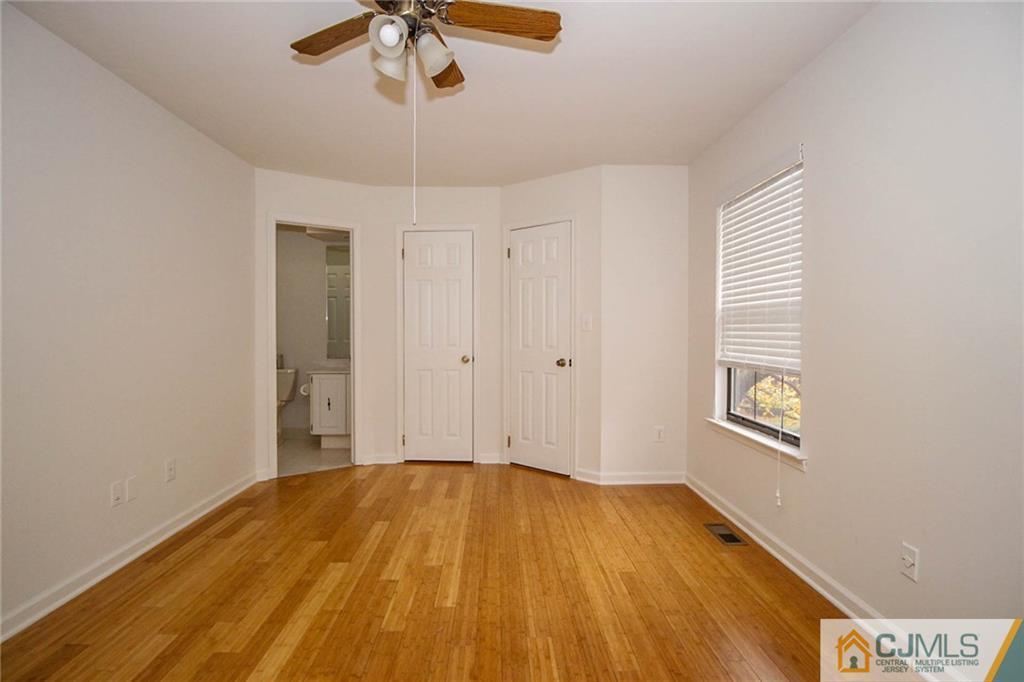 1705 Timber Oaks Road, Unit 1705 Edison, NJ 08820 - Photo 23 of 25 a view of empty room with ceiling fan