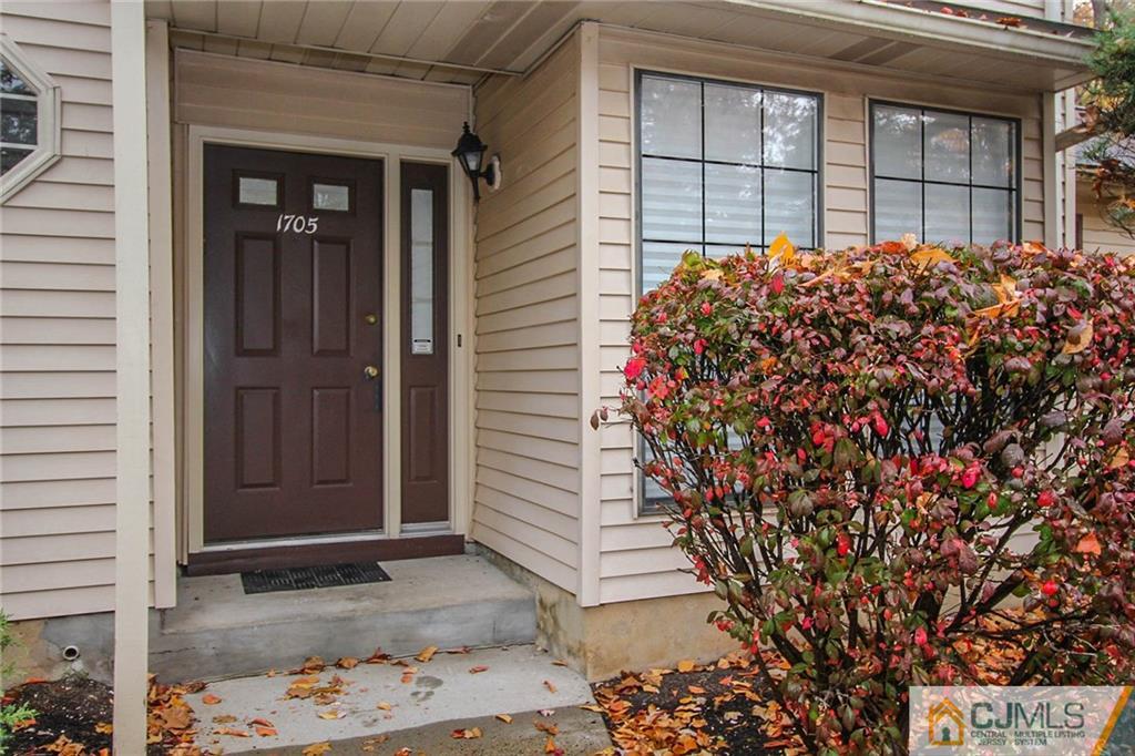 1705 Timber Oaks Road, Unit 1705 Edison, NJ 08820 - Photo 4 of 25 a front view of a house
