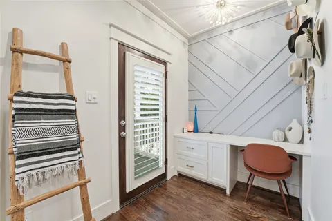 a bathroom with a granite countertop shower sink and mirror