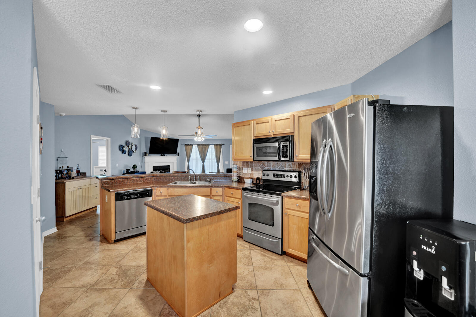 103 Citadel Lane Crestview, FL 32539 - Photo 11 of 41 a kitchen with stainless steel appliances granite countertop a refrigerator stove microwave and sink