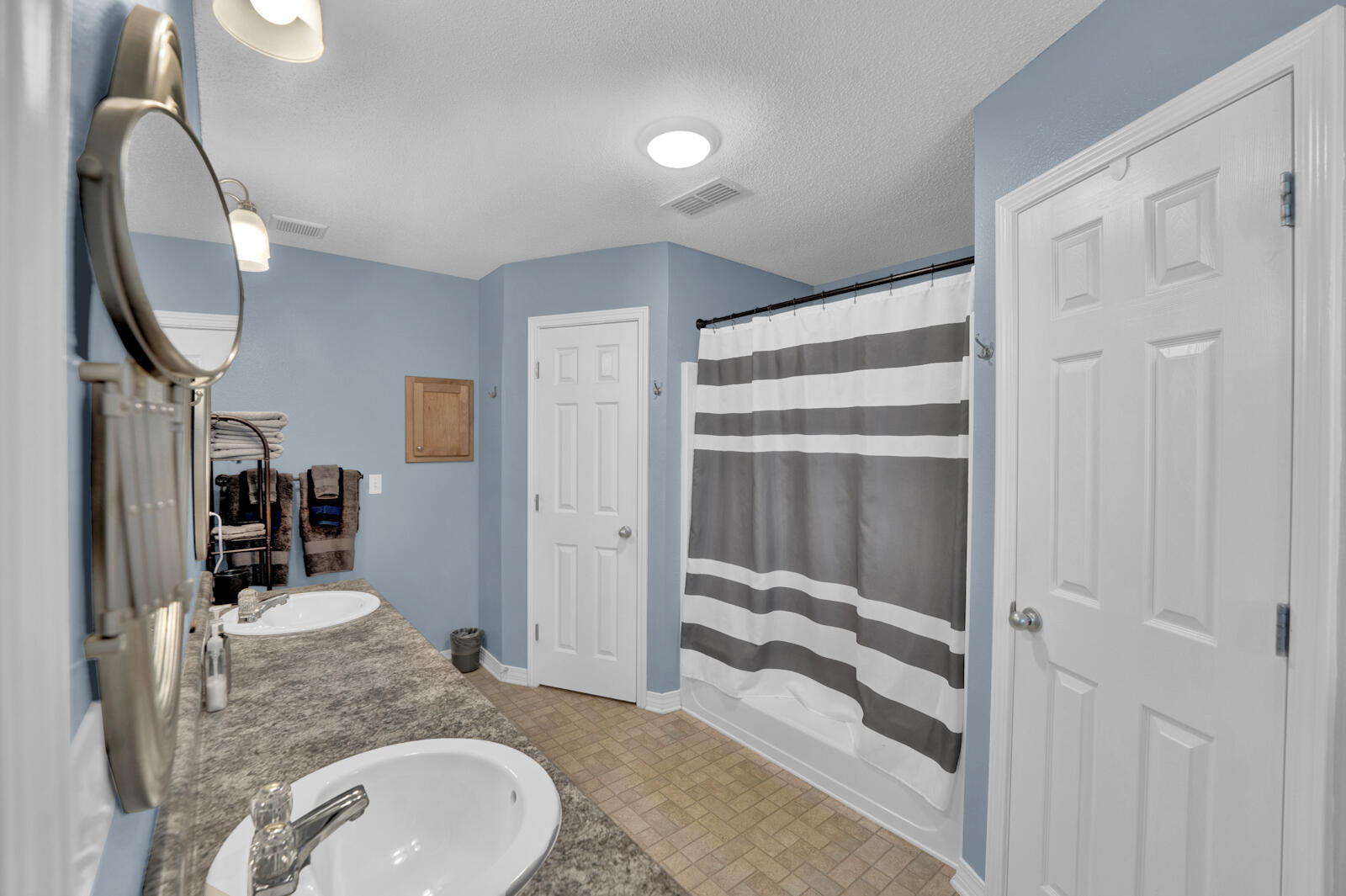 103 Citadel Lane Crestview, FL 32539 - Photo 17 of 41 a bathroom with a granite countertop sink and a mirror
