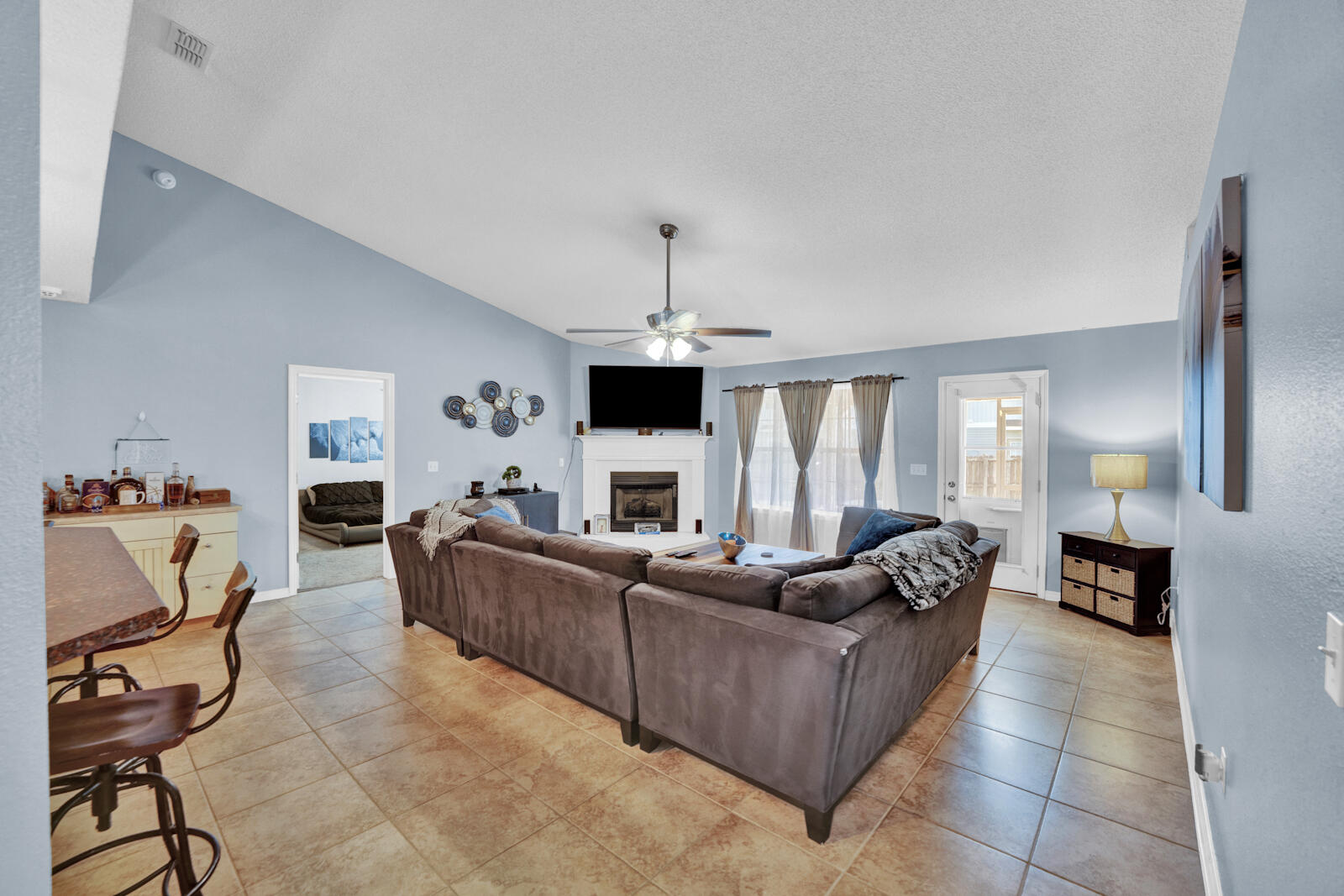103 Citadel Lane Crestview, FL 32539 - Photo 2 of 41 a living room with furniture and a fireplace