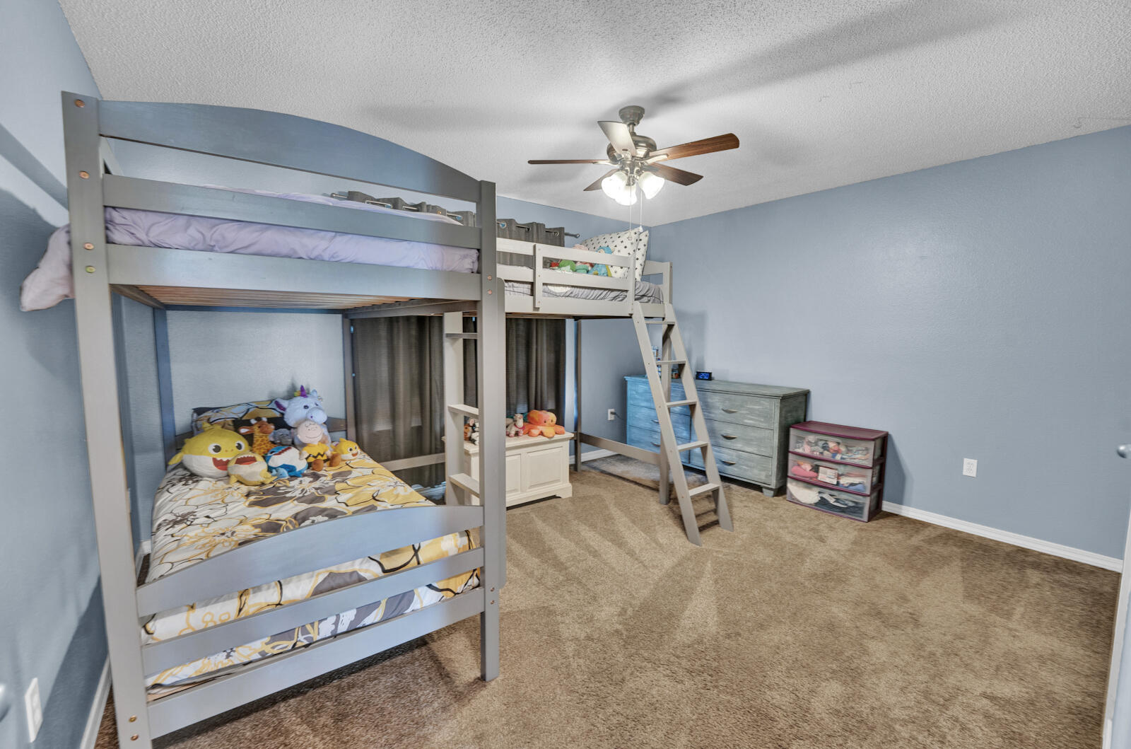 103 Citadel Lane Crestview, FL 32539 - Photo 21 of 41 a very nice looking room with a large bed and a chandelier