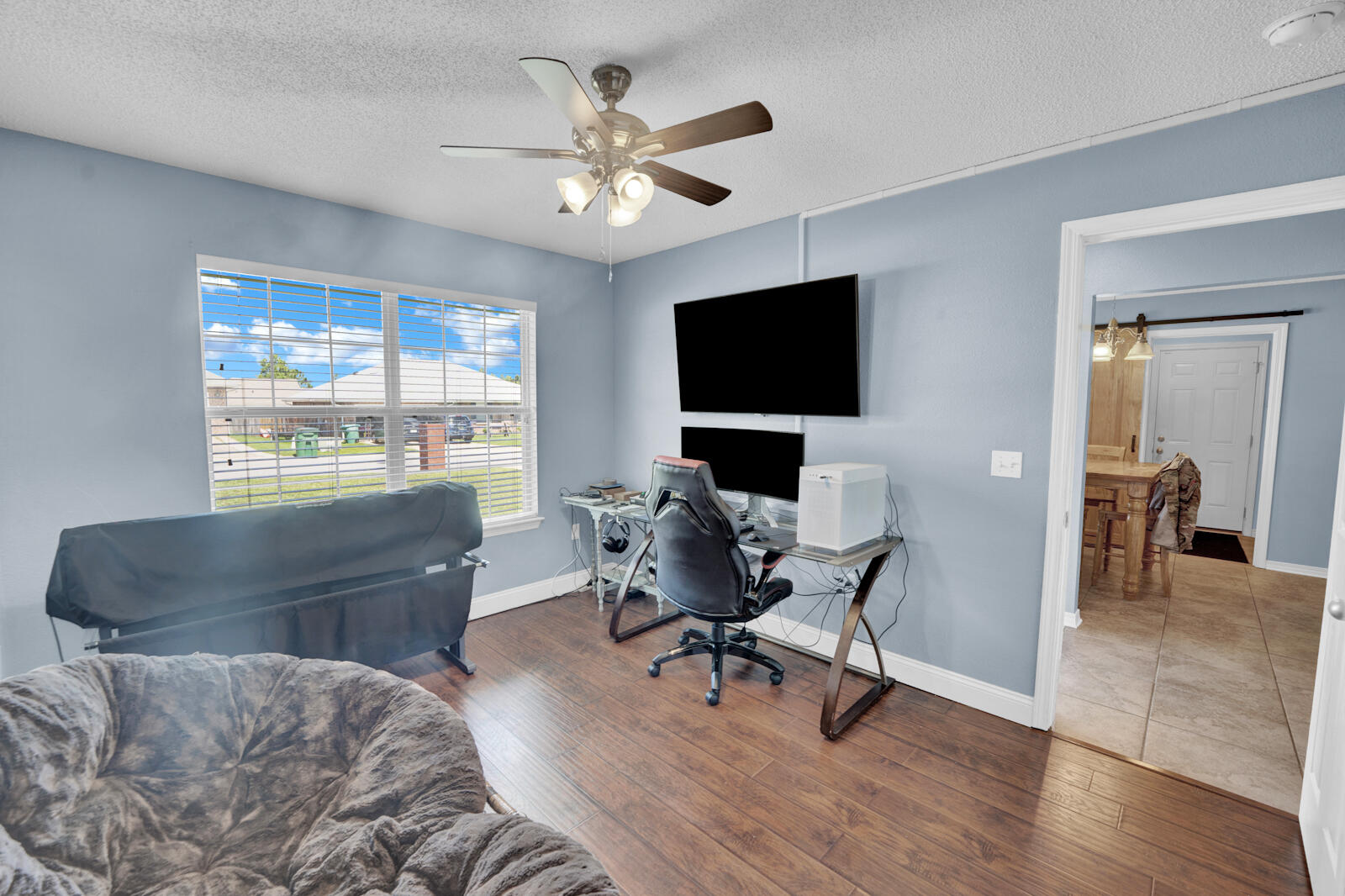 103 Citadel Lane Crestview, FL 32539 - Photo 25 of 41 a living room with furniture and a flat screen tv