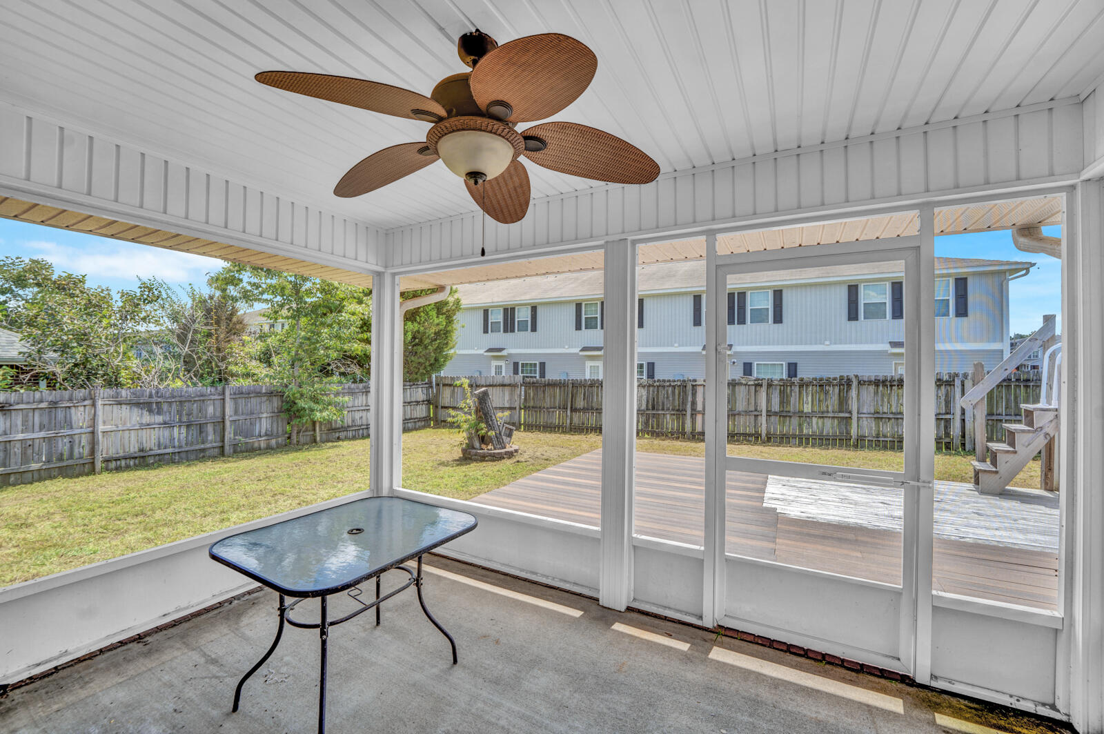103 Citadel Lane Crestview, FL 32539 - Photo 30 of 41 a view of a room with a large window and chandelier