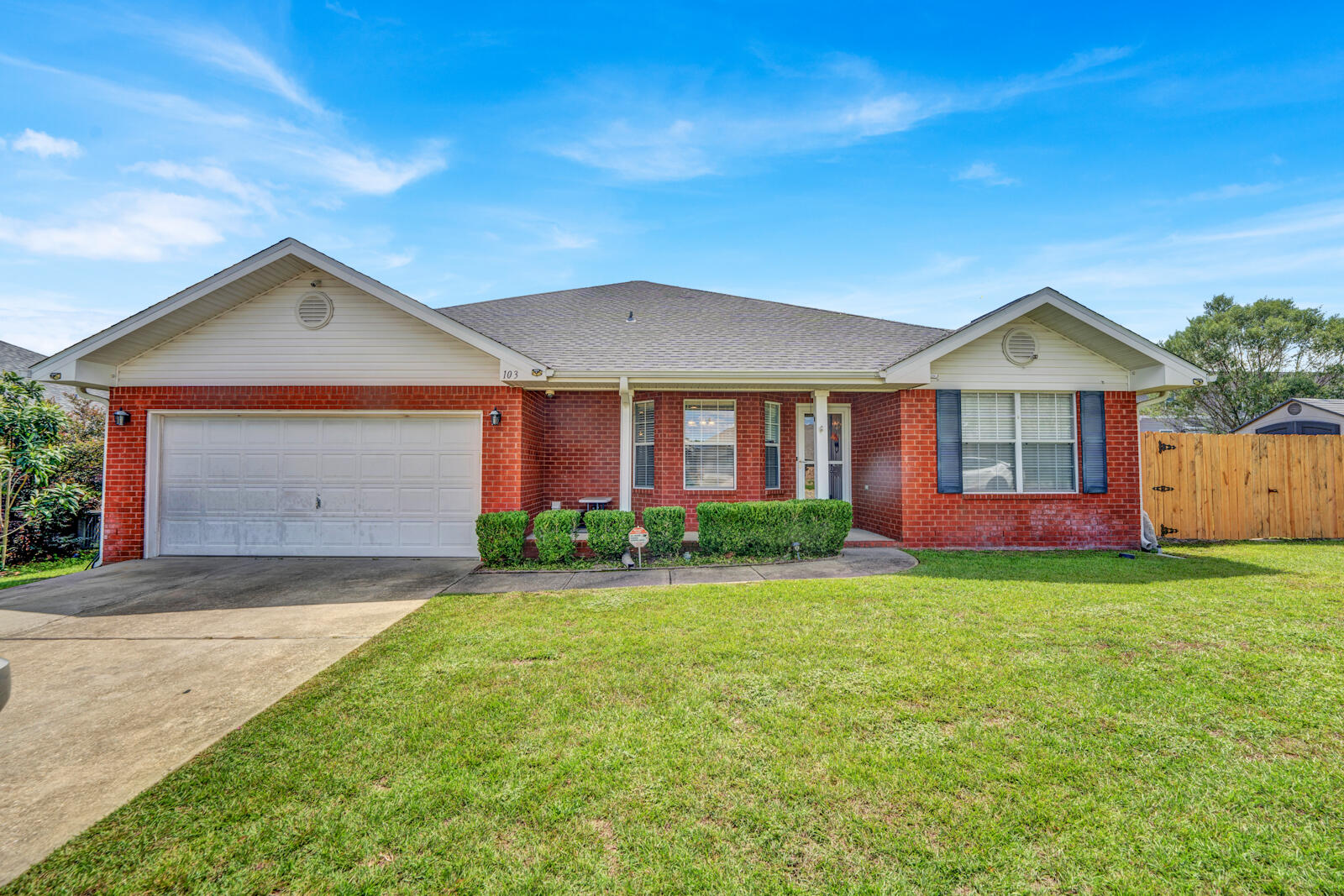 103 Citadel Lane Crestview, FL 32539 - Photo 36 of 41 a front view of a house with a yard and garage