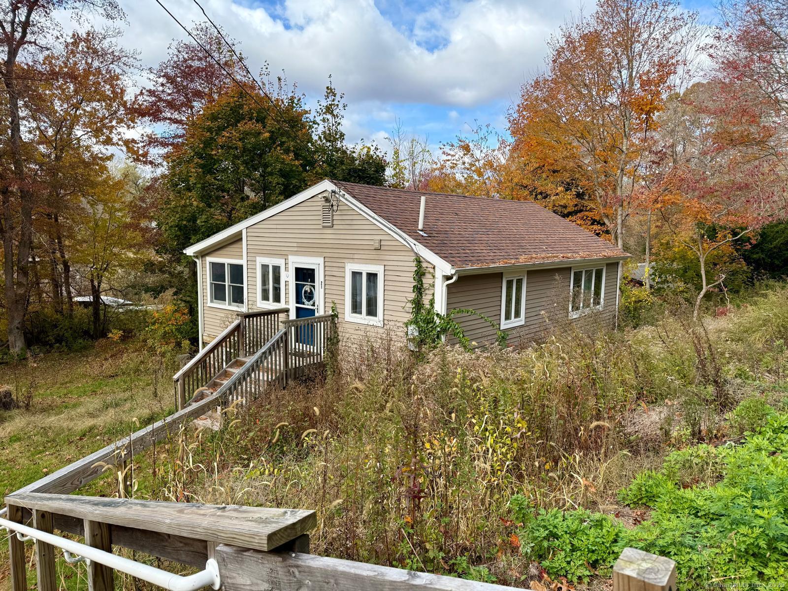 21 Boughton Road Old Lyme, CT 06371 - Photo 2 of 21 a front view of a house with yard