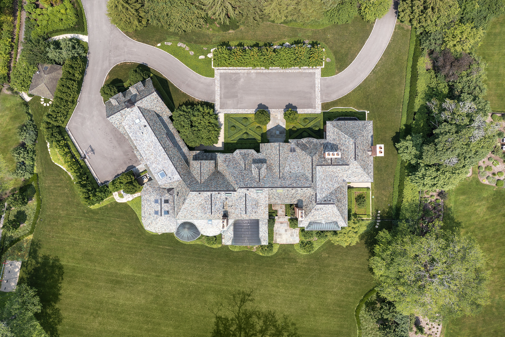 37 Woodley Road Winnetka, IL 60093 - Photo 16 of 66 an aerial view of a house with outdoor space pool seating area and garage