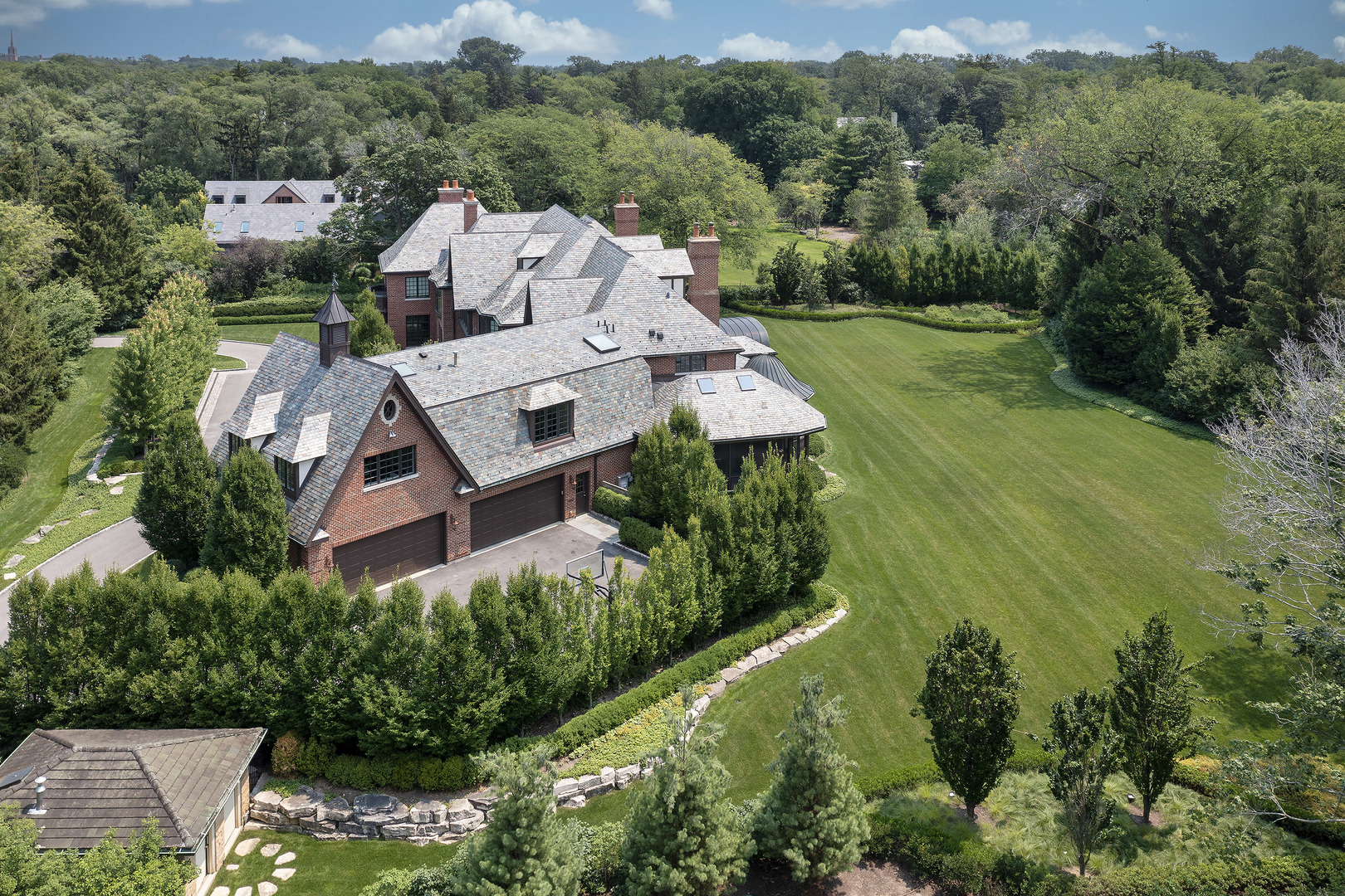 37 Woodley Road Winnetka, IL 60093 - Photo 9 of 66 an aerial view of a house with a garden