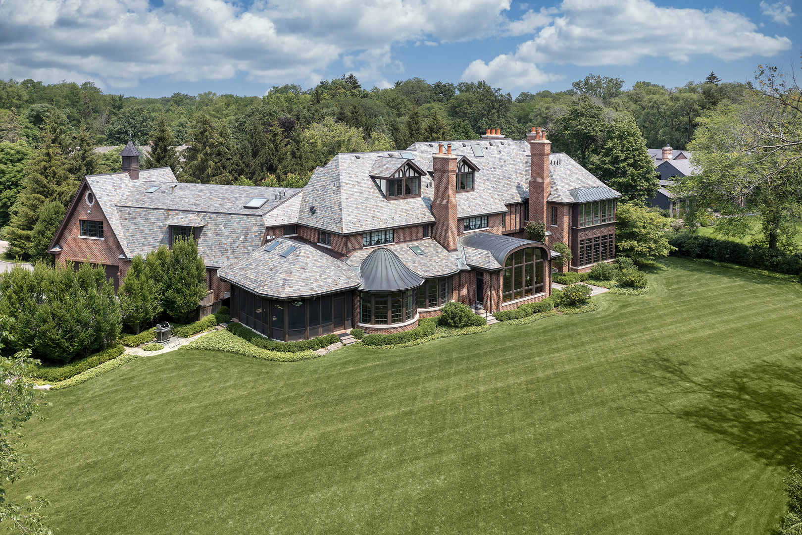 37 Woodley Road Winnetka, IL 60093 - Photo 10 of 66 an aerial view of a house with swimming pool and green space