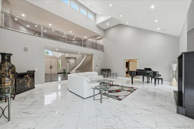 a living room with furniture and a table