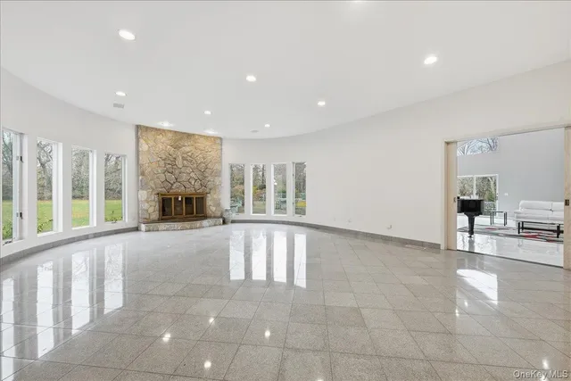 a view of livingroom with furniture and floor to ceiling window