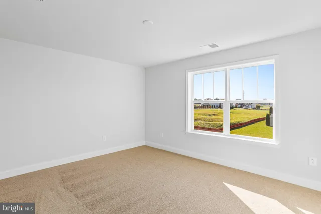 a view of a refrigerator in a kitchen