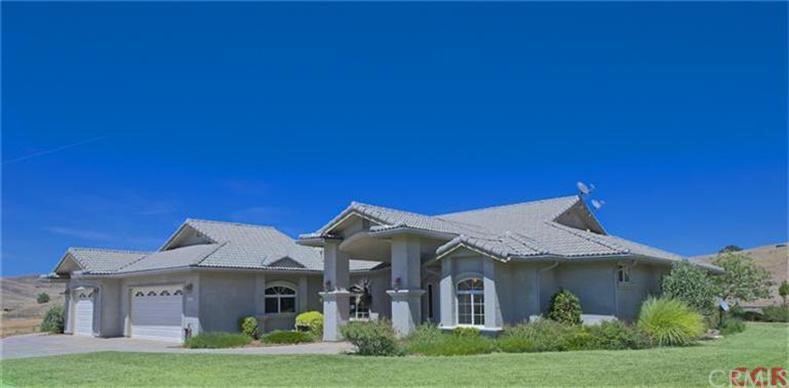 76925 Barker Road San Miguel, CA 93451 - Photo 1 of 1 FRONT HOUSE SHOWING THE WRAP AROUND LAWN, 3 CAR GARAGE, COVERED ENTRY AND A PEEK OF THE VIEW!