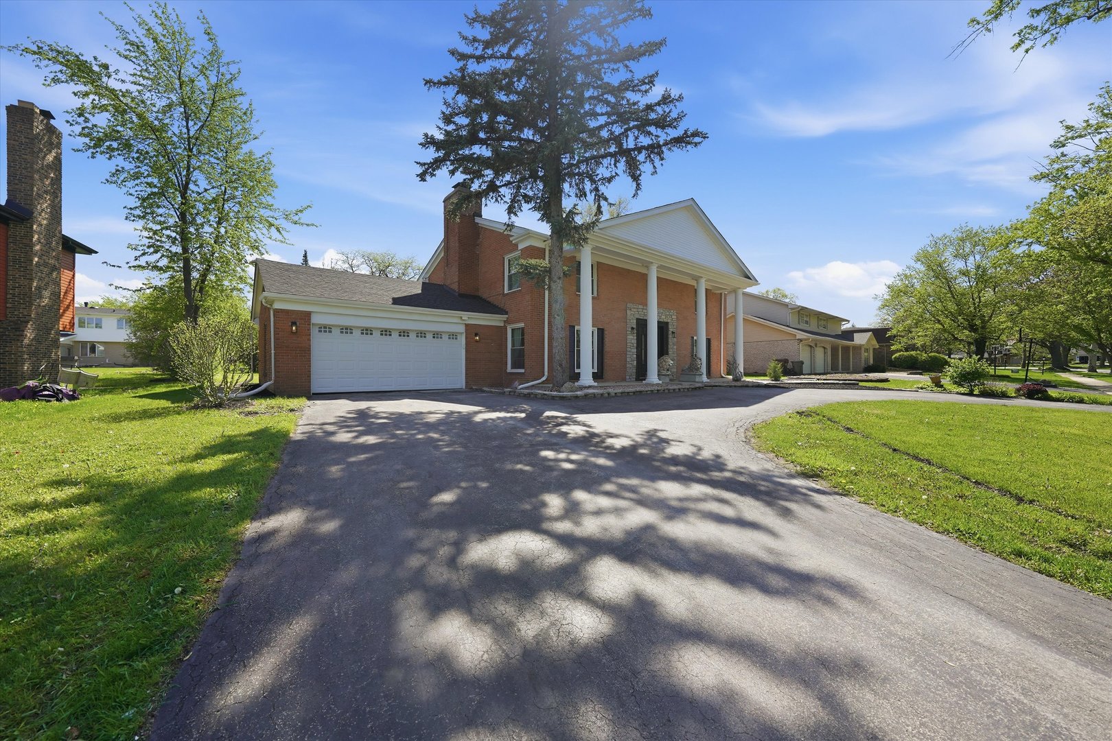 2932 Polly Lane Flossmoor, IL 60422 - Photo 2 of 53 a front view of a house with yard and green space