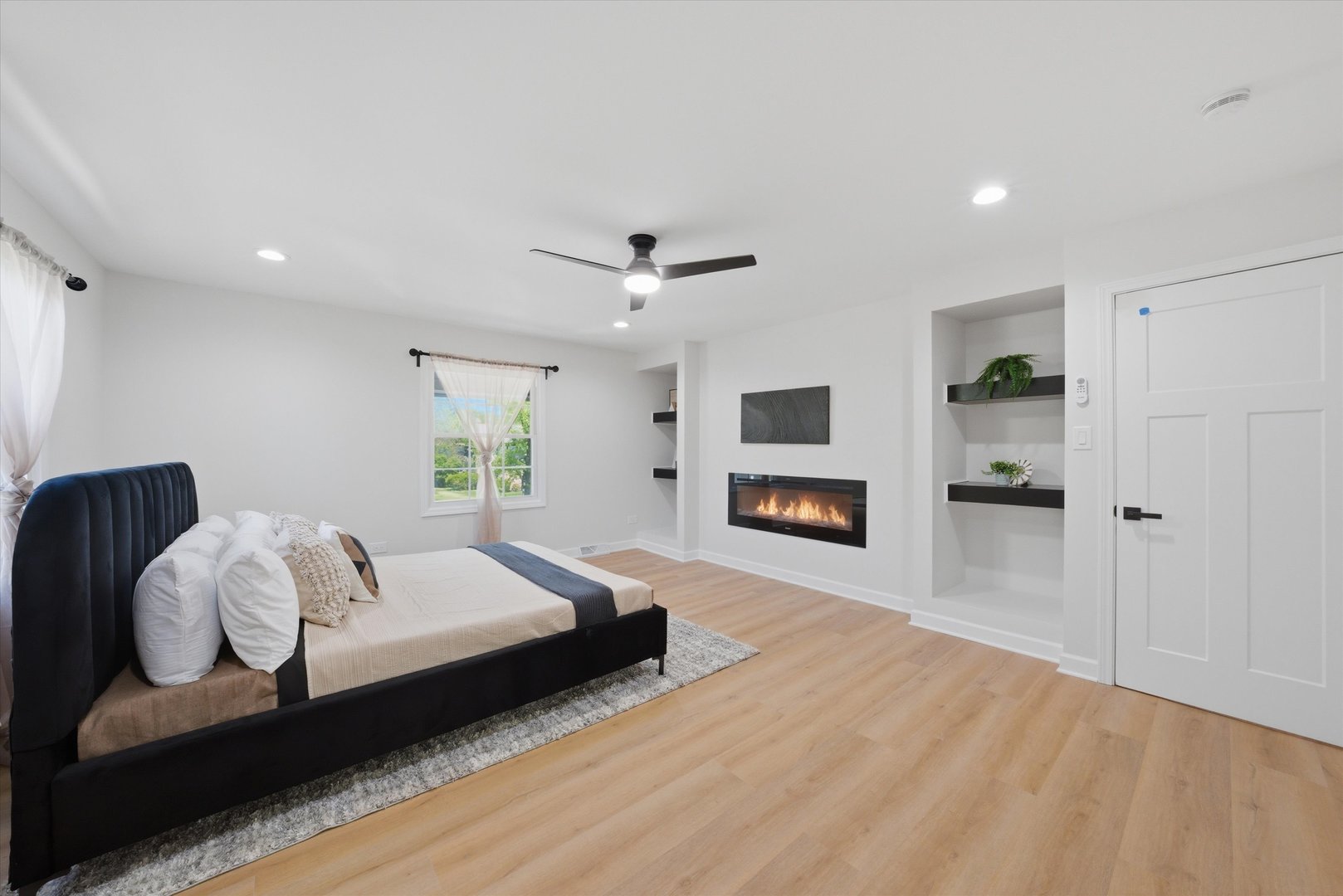 2932 Polly Lane Flossmoor, IL 60422 - Photo 23 of 53 a spacious bedroom with a bed and a fireplace