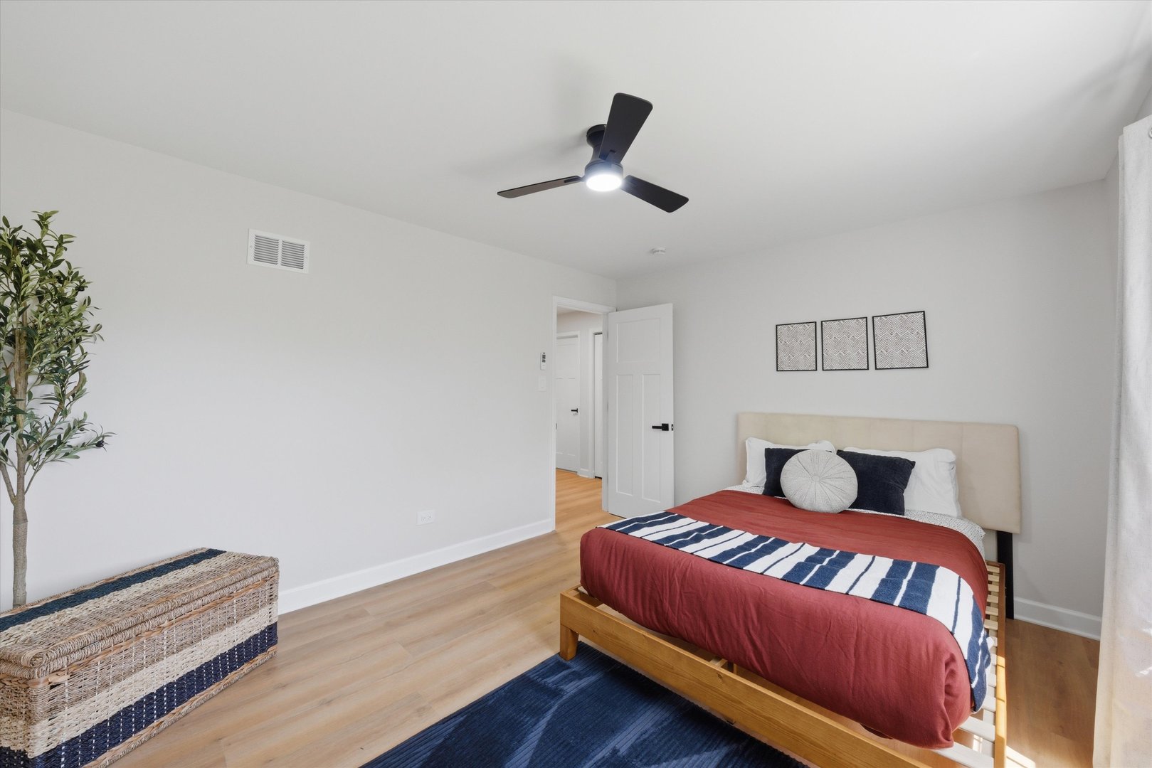 2932 Polly Lane Flossmoor, IL 60422 - Photo 28 of 53 a bedroom with a bed and a ceiling fan