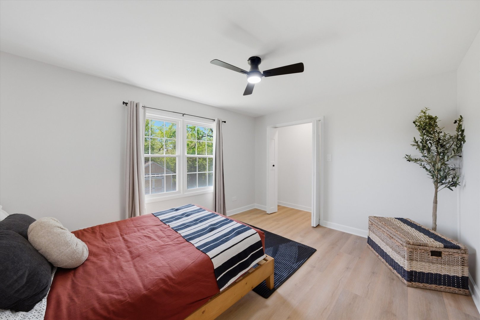 2932 Polly Lane Flossmoor, IL 60422 - Photo 29 of 53 a bedroom with a bed and a potted plant