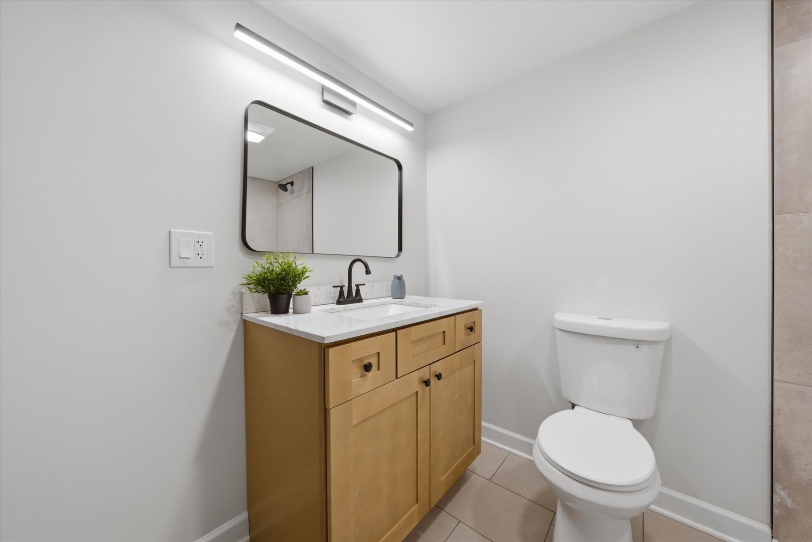 2932 Polly Lane Flossmoor, IL 60422 - Photo 41 of 53 a bathroom with a toilet sink and mirror