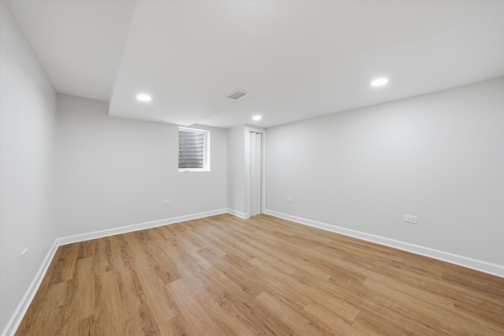 2932 Polly Lane Flossmoor, IL 60422 - Photo 42 of 53 a view of an empty room with wooden floor and a window