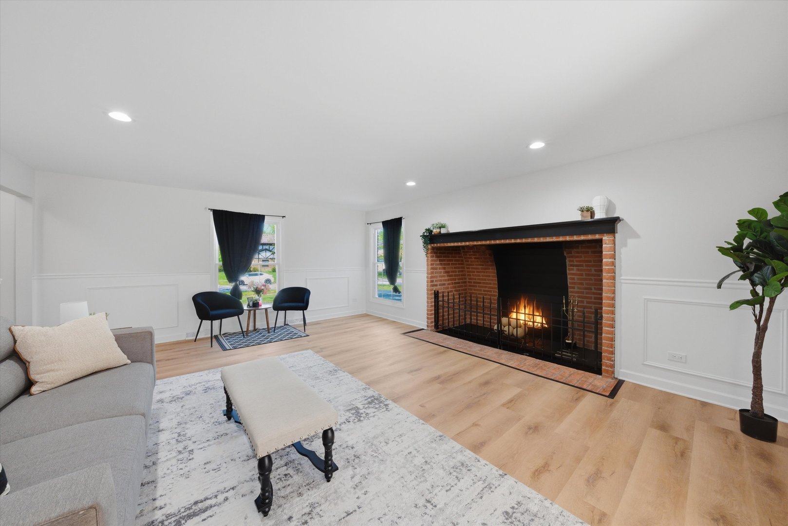2932 Polly Lane Flossmoor, IL 60422 - Photo 9 of 53 a living room with furniture a fireplace and a flat screen tv