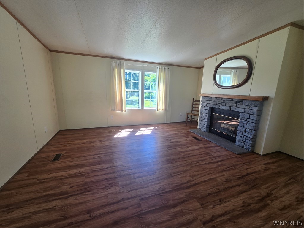 12507 Ridge Road Ridgeway, NY 14103 - Photo 5 of 22 family room (15 x 13) off kitchen, fireplace wood