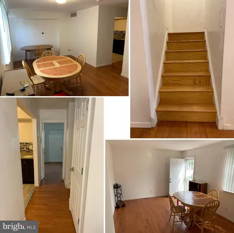 a view of a bedroom with wooden floor and chair