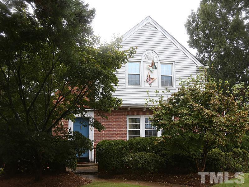 2404 White Oak Road Raleigh, NC 27609 - Photo 2 of 23 a view of a house with a yard and potted plants