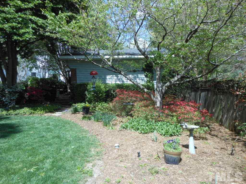 2404 White Oak Road Raleigh, NC 27609 - Photo 15 of 23 a garden view with a seating space