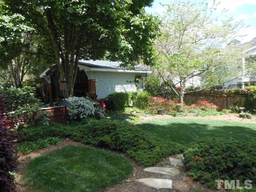 2404 White Oak Road Raleigh, NC 27609 - Photo 16 of 23 a view of backyard of house with green space